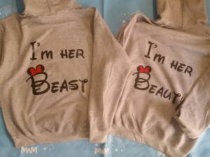 Adorable LGBT Lesbians apparel I'm Her Beast and I'm Her Beauty matching couples t shirts with kissing Minnie Mouse red bow and ears, unisex grey hoodies
